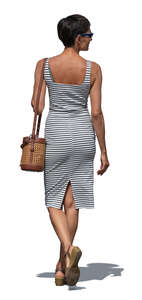 cut out woman in a fashionable striped dress walking