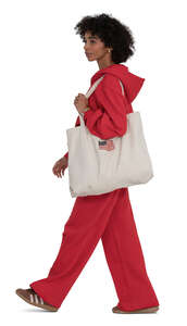 woman in a red jumpsuit walking