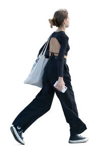 cut out young woman walking hastily