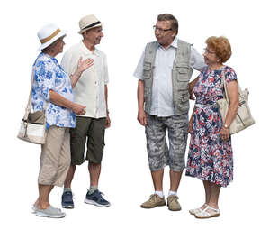 group of older people standing and talking