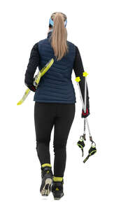 cut out woman with skis going skiing