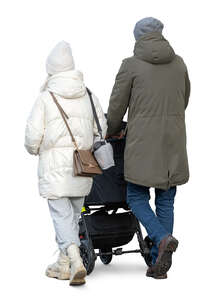 cut out family with a baby carriage walking in winter