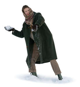 cut out woman throwing snowballs in winter