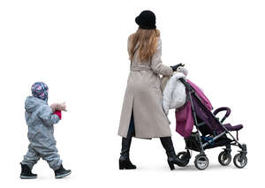 mother and son with a stroller walking in autumn