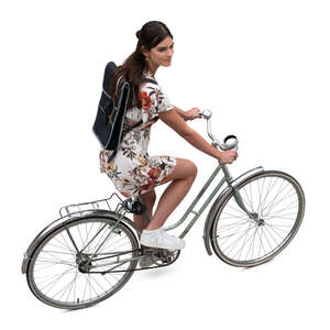 cut out woman in a dress riding a bike seen from above