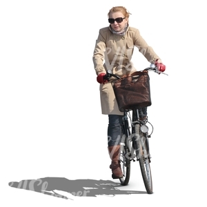 woman riding a bike in autumn