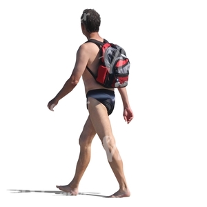 man in swimming pants walking barefoot