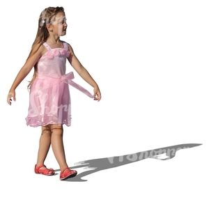 girl in a fancy pink dress walking