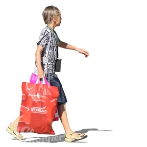 cut out boy with heavey shopping bags