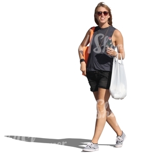 woman with sunglasses and groceries bag