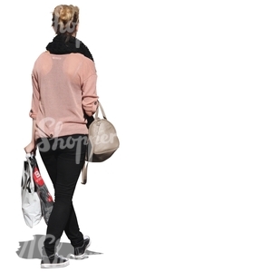 woman walking with bags in her hand