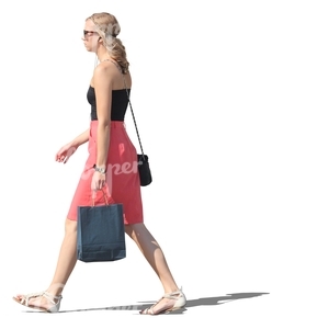 woman with a shopping bag walking