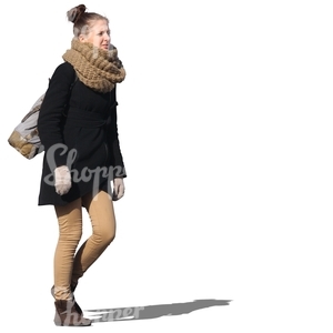 woman with a big scarf walking