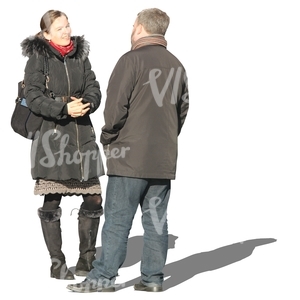 man and woman  talking in wintertime