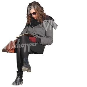 cut out woman sitting and reading a book