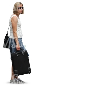 woman standing with a suitcase