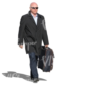 man in a black coat carrying a suitcase