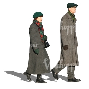 man and woman in grey winter coats walking