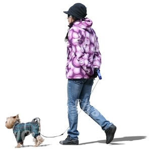 cut out woman walking a dog in winter