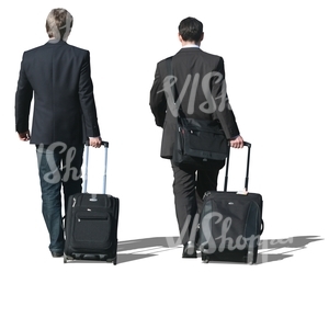 two travelling businessmen walking with suitcases