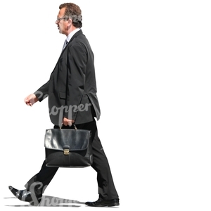 businessman walking with briefcase in hand