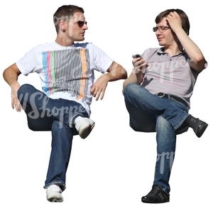 two cut out men sitting and talking