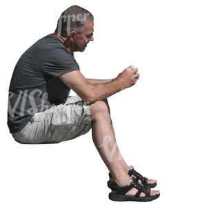 cut out man in shorts sitting