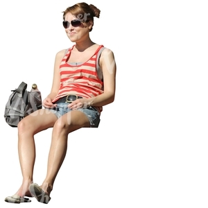 smiling woman with sunglasses sitting