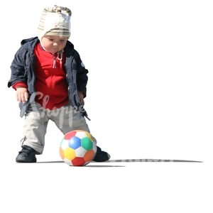 cut out boy playing with a ball