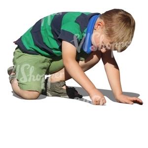 cut out boy playing on the ground