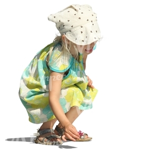 cut out girl in a summer dress squatting