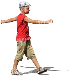 young boy with a hat walking arms apart
