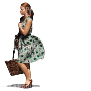 cut out woman in a summer dress walking