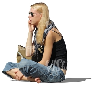 cut out woman sitting on the ground