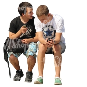 two men sitting and talking