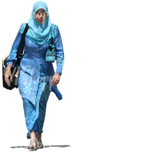 cut out muslim woman in a blue dress walking