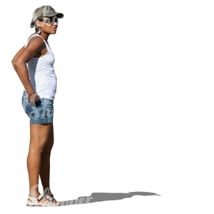 african woman in shorts standing