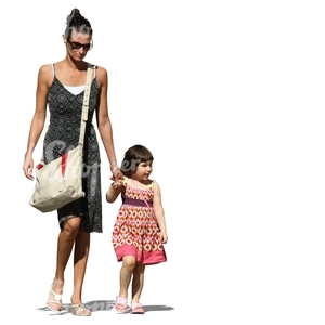 mother and daughter in summer dresses walking together