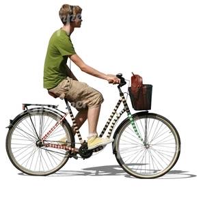 young man with headphones riding a bike