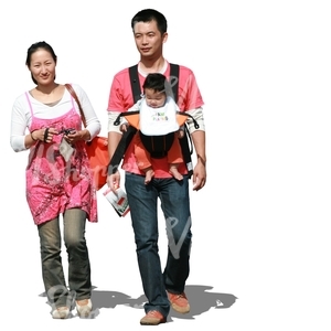 asian family walking with a baby