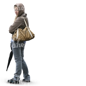 girl in a hoodie standing with an umbrella