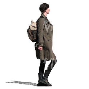 woman in a brown trench coat walking