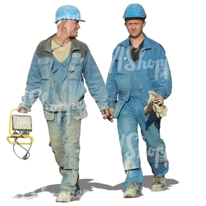 two construction workers walking