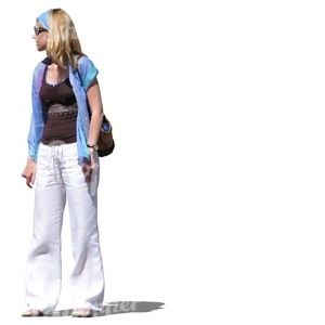 woman in white summer trousers standing