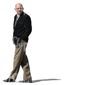 elderly businessman walking
