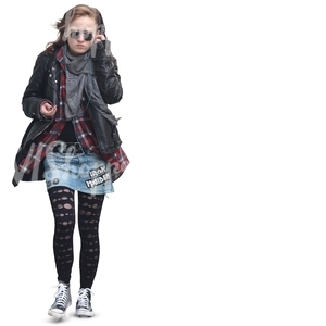 teenage girl in punk style outfit walking