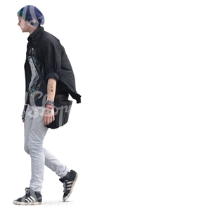 young man in punk style clothing walking