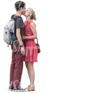 couple standing and kissing