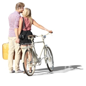 couple with a bike standing and kissing