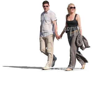 smiling couple walking hand in hand